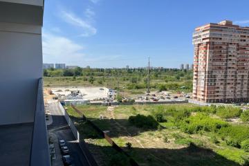 Фото №1: 2-комнатная квартира 50 м², 8/25 эт. - Краснодар, мкр. жилой комплекс Стрижи, ул. Автолюбителей, 1Гк1