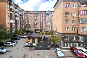 Фото №1: 2-комнатная квартира 54 м², 2/7 эт. - Краснодар, мкр. Музыкальный, ул. Ангарская, 2/2