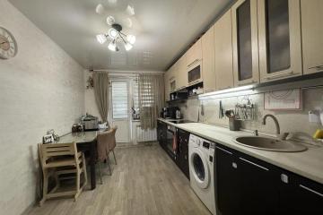 Фото №1: 2-комнатная квартира 58 м², 3/9 эт. - Краснодар, мкр. Краевая Клиническая Больница, ул. 1 Мая, 186