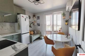 Фото №1: 2-комнатная квартира 57 м², 4/9 эт. - Краснодар, мкр. жилой комплекс Спортивная Деревня, ул. имени Генерала Корнилова, 18к1