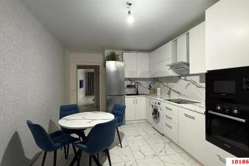Фото №1: 2-комнатная квартира 64 м², 12/19 эт. - Краснодар, мкр. Почтовый, пр-кт имени писателя Знаменского, 9к3