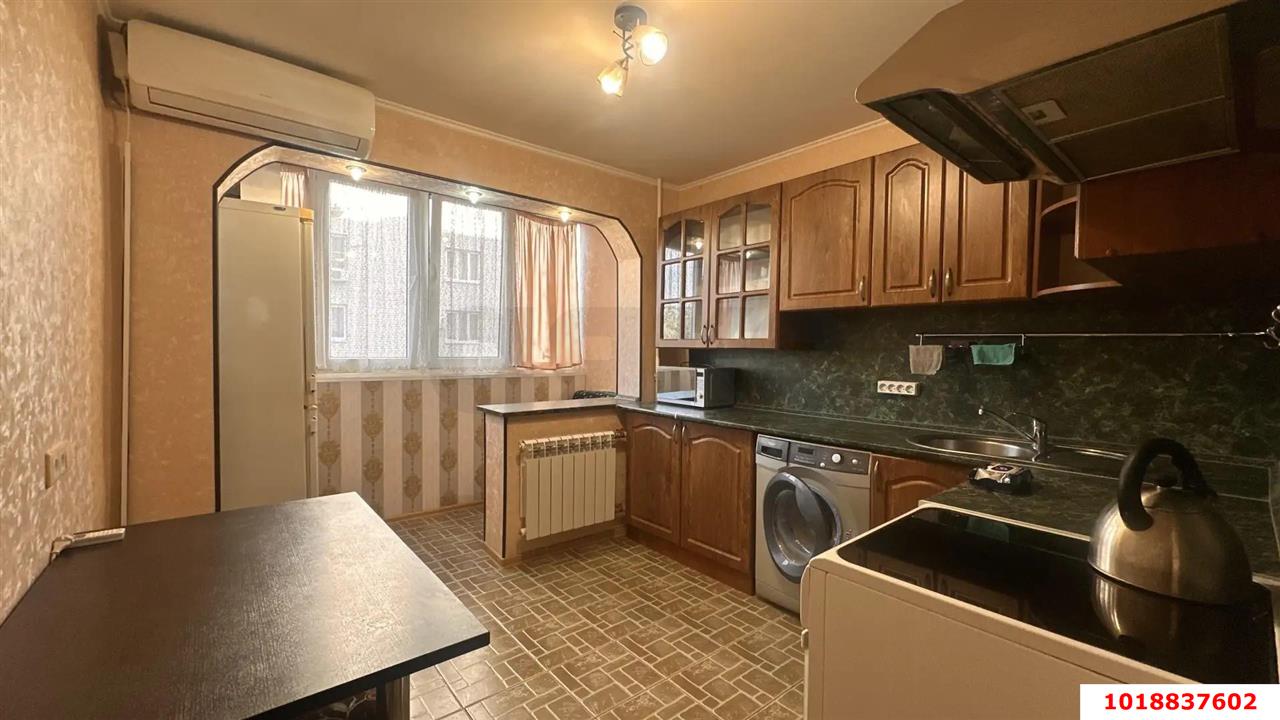 Фото №1: 2-комнатная квартира 56&nbsp;м², 4/12&nbsp;эт. - Краснодар, Прикубанский внутригородской округ, мкр. Краевая Клиническая Больница, ул. Черкасская, 53