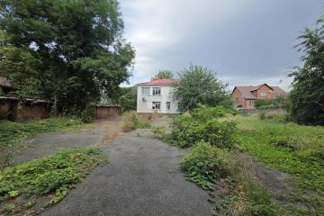 Фото №1: Отдельное здание 567&nbsp;м², 1/2&nbsp;эт. - Краснодар, мкр. Центральный, ул. Путевая, 85