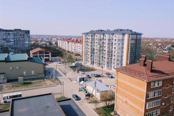 Фото №1: 2-комнатная квартира 55 м², 9/10 эт. - Афипский, ул. Пушкина, 115
